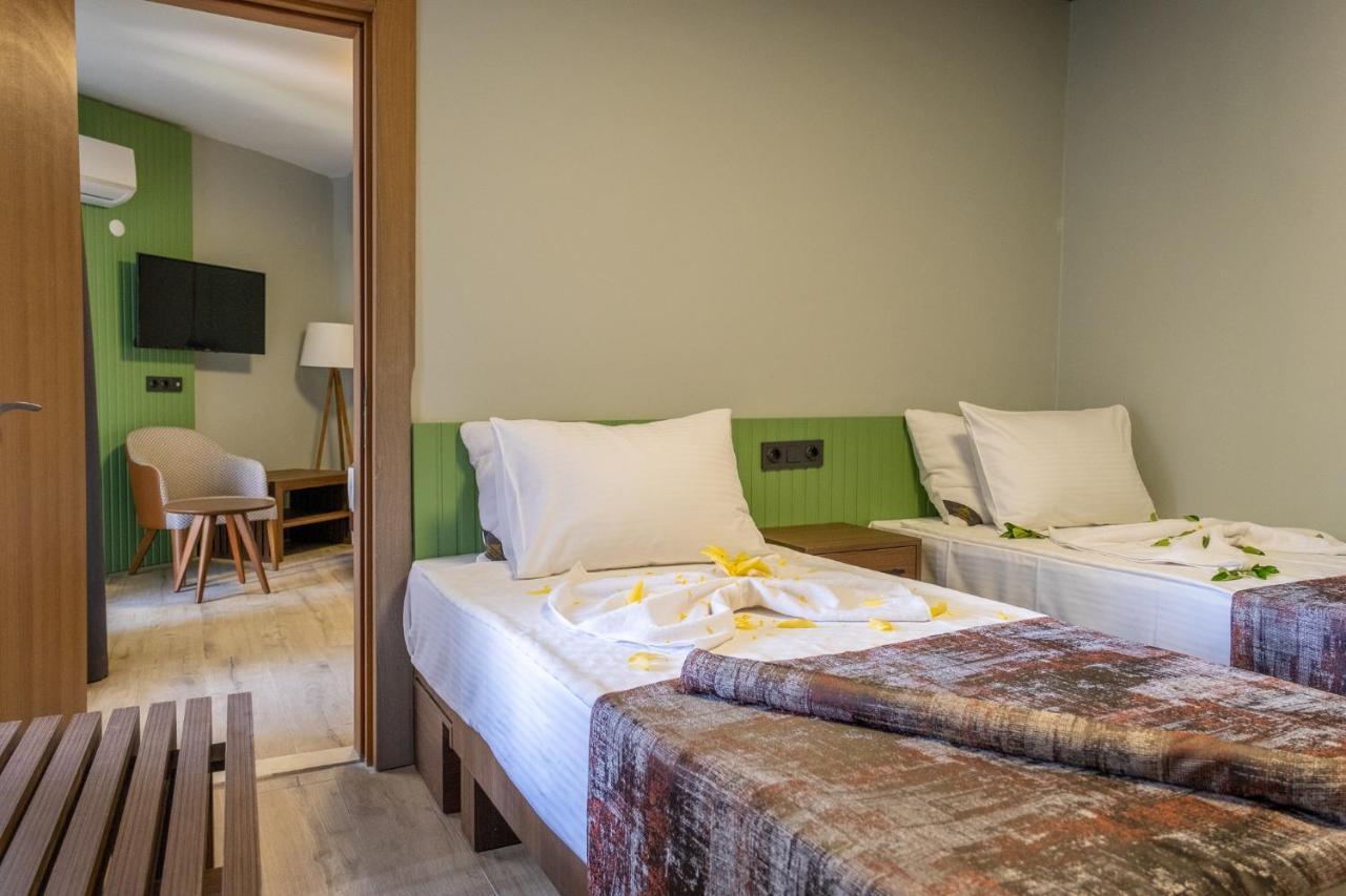 Assos Troy Beach Hotel Bagian luar foto