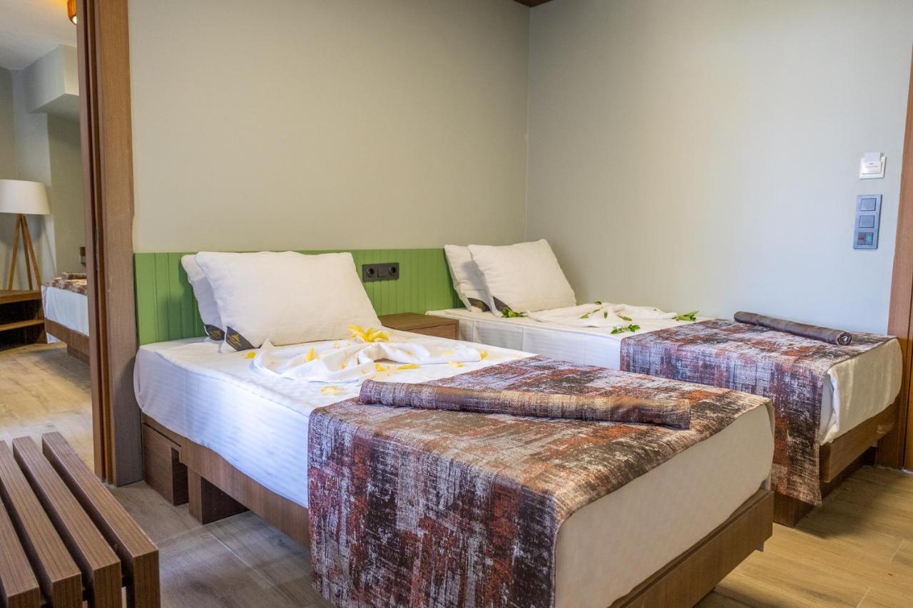 Assos Troy Beach Hotel Bagian luar foto